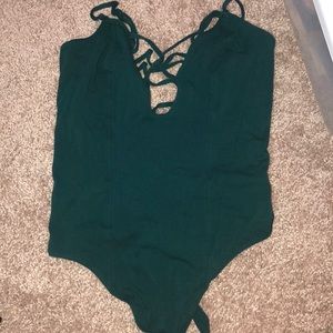 Express one eleven thong body suit in green